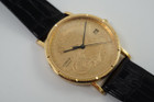 A fine Corum 20 Dollar Coin watch in 18k yellow gold, crafted during the 1990s. USA coin from 1897 exhibits little wear, with the classic ridged coin case and diamond crown. Durable for everyday wear, features a date aperture and black hands contrasting delightfully against the gold face, paired with a glossy alligator black strap.