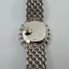 A fine vintage Audemars Piguet opal and diamond bracelet watch in 18k white gold, crafted during the 1980s. A stunning oval accessory for the fiery gem quality opal dial Audemars is renowned in selecting for their fine pieces, surrounded by round brilliant cut diamonds. Both the opal and diamonds catch the light in a way that refracts a glitter of rainbow colors. This piece will dazzle the wearer and suit a variety of occasions, its interlinked chain bracelet wearing comfortably on the wrist. Modeled on 6 inch wrist.

The opal has faint crack at 4 o’clock position that is imperceptible with the naked eye due to the competing opal. Light scratch on center crystal. 
Factory round cut .10 carat diamond set bezel; 2 carats total approximate.
Original opal dial, hands and crown. 
Case measures 21.5 x 22.5 mm, 6.5 mm thick. 
AP cal. 2430, 18 jewel backwind set movement. 
Case# 194xx Movement# 2636xx
Sapphire crystal. 
AP signed bracelet, measures and fits 6 3/4 inches or 17cm approximate, 12mm wide.