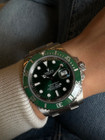 A very nice preowned Rolex Submariner reference 11610V in stainless steel, crated circa 2011. Not much more needs to be said of the popular and well-known Hulk version of the Submariner, it looks great on the wrist for those wishing a cool sports look with a pop of color with the green dial ceramic and bezel, the bold hour markers and hands providing a larger impact. Its box, card dated 04-2011 sold in the USA, and tags accompany this piece. 

Light scratches, small spot on ceramic bezel between 20-30.
Original dial, hands and sapphire crown. 
Case measures 40 x 47.5 mm.
Sapphire crystal. 
Rolex cal. automatic winding. 
Serial# G100xxx
Rolex bracelet contains 11 links, fits 7 1/2 in with glide-lock buckle. 
20 lug width.
Modeled on 5 5/8 inch wrist.