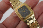A very nice vintage Audemars Piguet Royal Oak in 18k yellow gold, crafted from the mid to late 1980s. The gold hours, hands and AP hallmark vividly stand out against the dark grey tapisserie dial in the light, complementing the boldness of the square rectangular case and bracelet. A lovely everyday piece that wears comfortably on the wrist with a thin profile and closure. 

Original finish shows normal wear due to use. 
Original tapisserie dial, gold hands and gold crown. 
Case measures 25 x 33 mm. 
AP cal. 2502, 7 Jewel quartz movement.
Serial# B604xx Movement# 213740 
Sapphire crystal. 
Original Audemars bracelet fits 6 1/8 inch or 15.5cm approximate.
18mm lug width. 
Modeled on 6 inch wrist.
