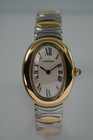 A fine preowned Cartier Baignoire reference W15045D8 in 18 yellow gold and stainless steel, crafted during the 2000s. A wonderful design with an attractive smooth oval case, featuring the classic off-white dial, black Roman numerals, blued steel hands, and blue sapphire crown. This versatile piece can be comfortably worn with its steel and gold Casque D'Or bracelet with hidden clasp, or alternatively with a black leather strap adopting a more casual feel. 

Minimal scratches. 
Original dial, hands and crown.
Case measures 22.5 x 31 mm, 7mm thick. 
Carter quartz movement. 
Serial# 8057xxx-42xx
Acrylic crystal, light scratches.
Cartier gold and steel bracelet, fits 6 3/4 inches or 17.3cm approximately.
13mm lug width.