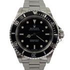 A fine preowned Rolex Submariner non-date reference 14060M in stainless steel originally sold in Hong Kong with papers dated Jan. 2003 and tags, crafted circa 2003. Classic and enduring 40 mm case for casual wear with black bezel, black dial and large lume white round and baton hour markers, and white lume sword-shaped hands. 13 mm silhouette with flip lock steel clasp for secured and comfort fit.

Light wear, small nick located bottom right lug.
Original dial, hands, and crown.
Case measures 40 x 47 mm, 13 mm thick.  
Rolex cal. 3130, highly jeweled automatic winding.
Sapphire crystal.
Serial# Y2135xxx
Rolex flip lock steel bracelet fits 7 3/4 inches.
20 mm between lugs.
Modeled on size 7 3/4 inch wrist.