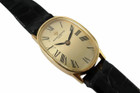 A wonderful Vacheron Constantin ladies watch reference 18220 in 18k yellow gold, crafted during the 1950s. Strong oval 18mm case with 12mm silhouette housing a gold colored dial, black Roman numeral hour markers and blackened-steeled feuille hands. This dainty accessory can be worn for a variety of occasions, a classic with the gold frame and black crocodile strap. 

Minimal scratches.
Original dial, hands and crown. 
Case measures 18 x 28mm, 12mm thick.
V+C cal. 1430, 18 jewels manual winding.
Sapphire crystal.
Serial# 5201xx Movement# 674457
V+C black crocodile strap (85% condition approximation).
V+C 18k gold buckle.
Modeled on a 6 inch wrist.