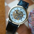 Fabsuisse watch
Fabsuisse vintage
Breguet classique
Breguet skeleton
Breguet sleletonized
Breguet 3020BA
Breguet rare watch
Skeleton watch 18k
Breguet vintage
Breguet vintage 18k
Breguet vintage gold
Breguet gold skeleton
Breguet skeleton vintage
Breguet skeletonized watch
Original dial, hands and crown.
Case measures 33.4 x 38mm, 5mm thick.
Breguet cal. 503SQ manual wind, 18 jewels gold skeletonized hand engraved movement. 
Case# 36xx
Exhibition case back. 
Sapphire crystal.
Breguet black textured leather strap (90% condition, approximation).
Fits up to 7 1/8 inches.
Breguet 18k tang buckle.
19mm lug width.
Modeled on 6 inch wrist.