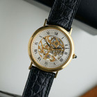 Fabsuisse watch
Fabsuisse vintage
Breguet classique
Breguet skeleton
Breguet sleletonized
Breguet 3020BA
Breguet rare watch
Skeleton watch 18k
Breguet vintage
Breguet vintage 18k
Breguet vintage gold
Breguet gold skeleton
Breguet skeleton vintage
Breguet skeletonized watch
Original dial, hands and crown.
Case measures 33.4 x 38mm, 5mm thick.
Breguet cal. 503SQ manual wind, 18 jewels gold skeletonized hand engraved movement. 
Case# 36xx
Exhibition case back. 
Sapphire crystal.
Breguet black textured leather strap (90% condition, approximation).
Fits up to 7 1/8 inches.
Breguet 18k tang buckle.
19mm lug width.
Modeled on 6 inch wrist.
