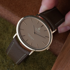 Universal Geneve Golden Shadow 18K Gold Automatic Oval Dress Watch 1970s