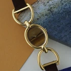 Vintage Chopard L.U.C. Tiger’s-Eye Stirrup Watch 18k Yellow Gold 1970s