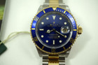 Rolex 16613 Submariner stainless steel & 18k with M series original card, booklets, tags & box for sale Houston Fabsuisse