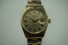 Rolex 1550 Date gold top & steel case back w/ papers, book, & hang tags c. 1971