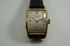 Patek Philippe 2470 Tonneau 18k yellow gold rare Gubelin w/ archive C.1952 vintage pre owned for sale houston fabsuisse