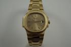 atek Philippe 4700 Nautilus ladies 18k yellow gold dates 1990's pre owned for sale houston fabsuisse