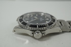 Rolex 14060 M 2-Line Submariner full halogram "Z series" bookks & tags 2006-2007 modern highly jeweled automatic original watch pre owned for sale houston fabsuisse