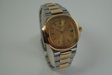 PATEK PHILIPPE NAUTILUS REF.4700/1 STAINLESS & 18K YELLOW GOLD LADIES C. 1990's