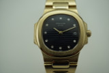 Patek Philippe 4700 Nautilus ladies solid 18k yellow gold dates 1990'S  for sale houston fabsuisse