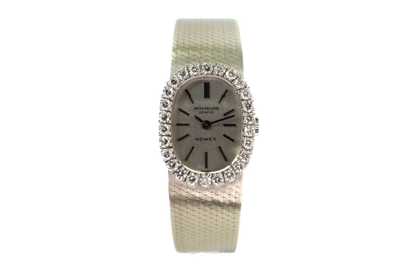 Patek Philippe 3377-1 Ladies Ellipse 18k white gold & diamond bracelet watch 1970's pre owned for sale houston fabsuisse