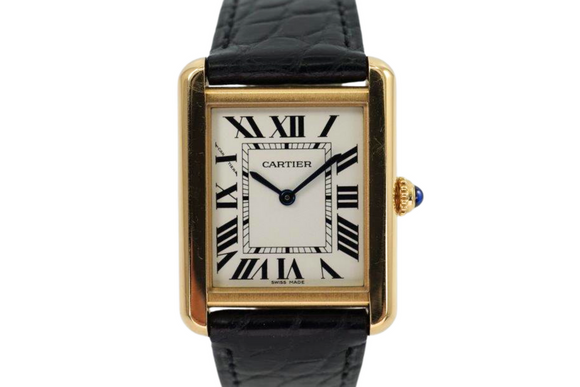 A very nice preowned Cartier Tank Solo reference 3168-W5200002 in 18k yellow gold Cartier Tank Solo, crafted circa 2010s.  An enduring classic with simple rectangular softly edged case housing a white dial and black Roman numeral hour markers with inconspicuous Cartier logo at 10 o’clock, black inner minute track and blued-steel sword-shaped hands and blue spinel beaded crown. Paired with the black crocodile strap, will suit a variety of settings, sitting comfortably on the wrist with its 5mm silhouette.

Original dial, hands and Cartier sapphire crown.
Sapphire crystal.
Case measures 24.5 x 31mm, 5 mm thick.
Cartier quartz movement.
Serial# 7628XXXX
Cartier black alligator strap (85% condition).
Cartier 18k tang buckle.
18mm lug width.