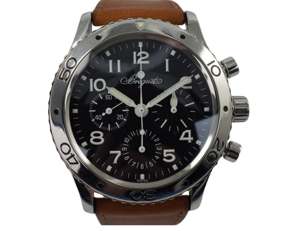 BRAND:                           Breguet
MODEL:                           Flyback
CASE MATERIAL:            Stainless steel
CASE MEASURES:          39 x 46 mm
MOVEMENT:                     Automatic winding. 
FUNCTIONS:                    Chronograph 
CONDITION:                     Fine
See it in our eBay store.

A very nice preowned Breguet Type XX reference 3800 in stainless steel, crafted during the 2000s. A sports look on the wrist with large white numerals on black matte dial in a non-overpowered case, differing to the current popular oversized models. Features the flyback chronograph renown to Breguet and a tan leather strap. Modeled on a 6 inch wrist. 

Light scratches.
Original black dial, hands and crown. 
Case measures 39 x 46 mm, 15 mm thick. 
Breguet cal. automatic winding.
Serial# 1076xx 
Sapphire crystal.
New premium non-Breguet dark tan leather strap.
Breguet steel deployment buckle.
Will include the Breguet black leather strap (65% condition approximate). 
21 mm between lugs.