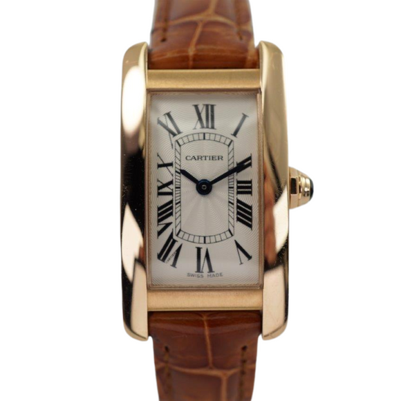 A fine preowned Cartier Tank Americaine with Cartier card, crafted circa 2018. This Tank model from Cartier may not be as popular as its other variants, we think this particular configuration of the petite albeit beefy rectangular 19 mm rose gold polished and brushed finish case paired with the saddle colored crocodile strap create a fetching accessory, notably so with the guilloche dial backdrop to the standard black Roman numeral hours with an inconspicuous Cartier signature at 7 o’clock, inner chemin de fer minute track and blued-steel sword-shaped hands, topped with a faceted gold and blue sapphire crown. The slightly elevated 6.5 profile adds more impact to the wrist, for that carefree wear that is suitable for a variety of occasions.