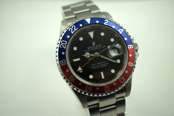 ROLEX 16710T GMT II ,MINT STAINLESS STEEL "Z SERIES" DATES 2006 PRE-OWNED FOR SALE HOUSTON FABSUISSE