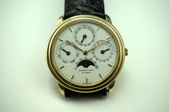 Audemars Piguet 25657 Quatieme Perpetual 18k yellow gold w/ book c. 1995 moon phase all original pre owned for sale houston fabsuisse 