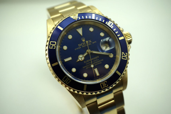 ROLEX 16618 SUBMARINER 18K SOLID GOLD BOX,PAPERS, BOOKS DATES 2003  PRE-OWNED FOR SALE HOUSTON FABSUISSE