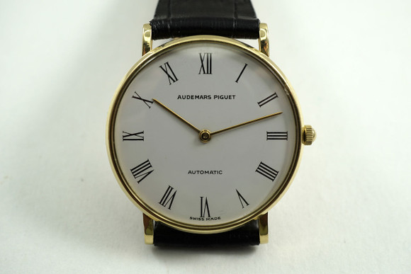 Audemars Piguet 18k yellow gold round automatic rare display back c. 1980's pre owned for sale houston fabsuissse