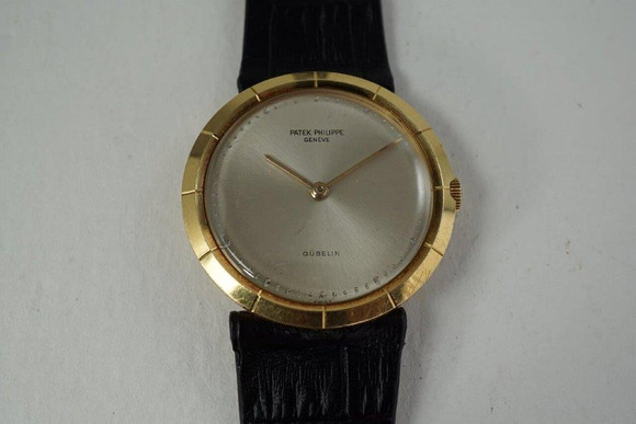 Patek Philippe 3459 retailed by Gubelin 18k yellow gold dates 1960's pre owned for sale houston fabsuisse