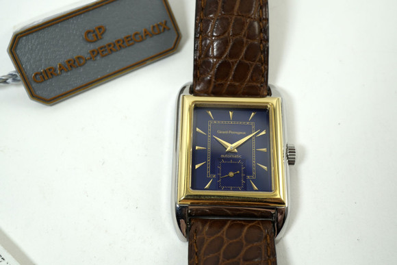 Girard Perregaux 25200.0.55 1945 Richeville box & books 1990's stainless steel and yellow gold automatic pre owned for sale houston fabsuisse