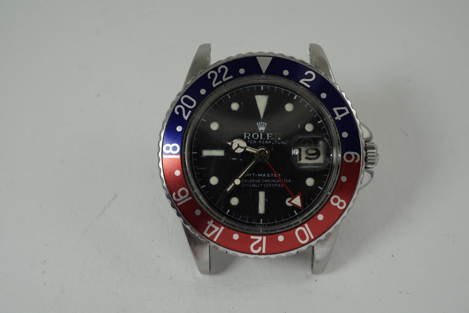 Rolex 1675 GMT w/ chronometer and papers dates 1963-64 pointed crown guard automatic vintage pre owned for sale houston fabsuisse