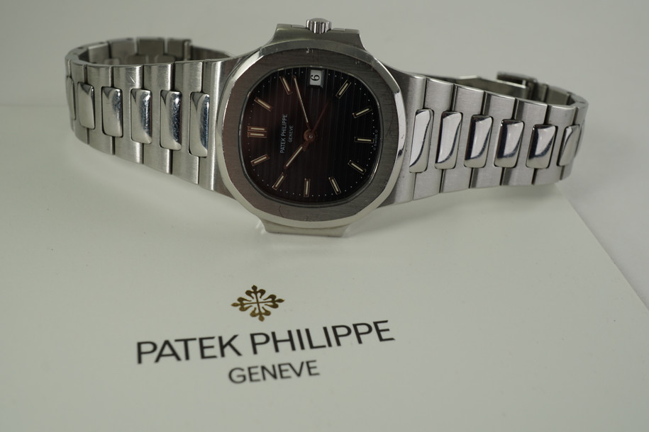 Patek Philippe 3800/1 Nautilus stainless steel w/ archive dates 1991 modern pre owned automatic for sale houston fabsuisse