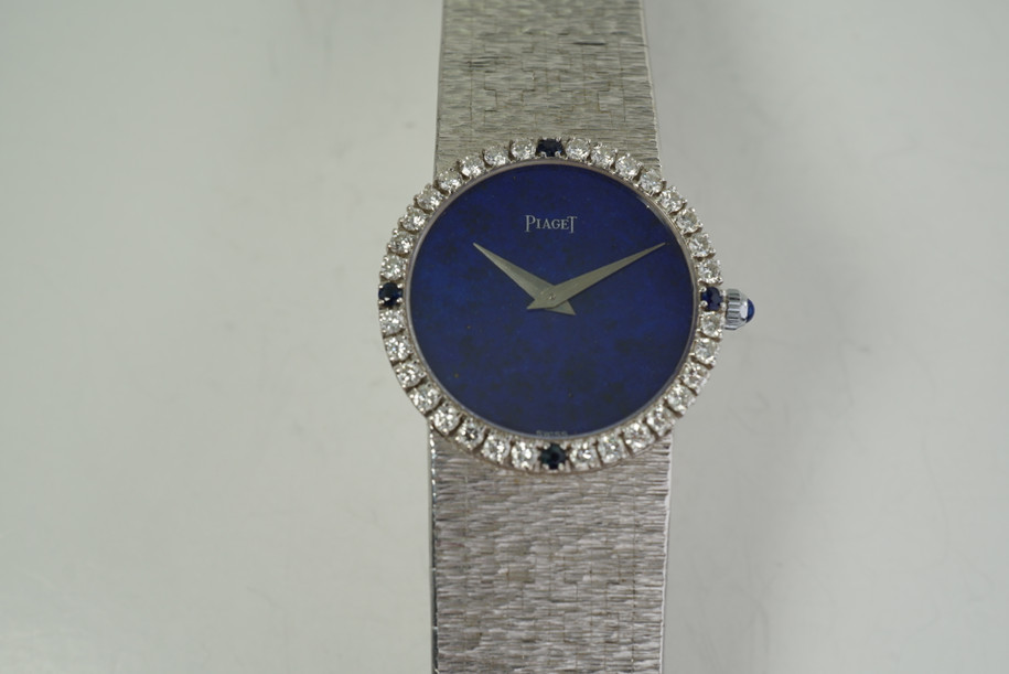 Piaget 9706 A6 Diamond Bracelet Watch factory lapis dial dates 1970's 18k white gold vintage pre owned for sale houston fabsuisse