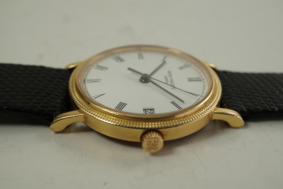 Patek Philippe 3802 Calatrava hobnail w/ date automatic 18k yellow gold c. 1990's modern pre owned for sale houston fabsuisse