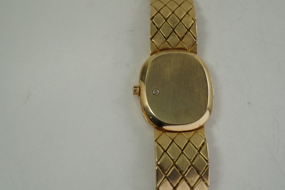 Patek Philippe 4764/011 Ellipse 18k yellow gold w/ box and papers c. 1992 for sale houston fabsuisse