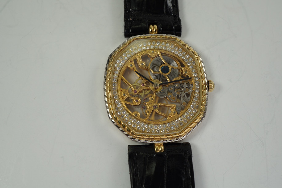 Gerald Genta Skeletonized Wristwatch 18k white & yellow w/ factory diamonds c. 1980's pre owned for sale houston fabsuisse
