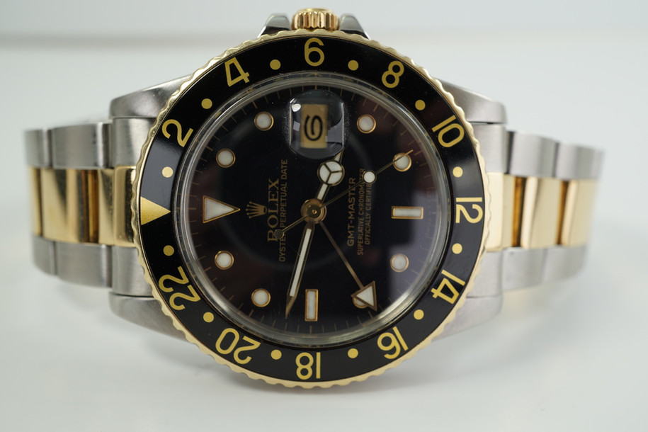 Rolex 16753 GMT 18k yellow gold & stainless steel w/ oyster bracelet dates 1980 automatic pre owned for sale houston fabsuisse