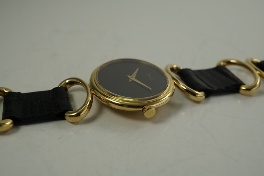 Piaget 9802 Ladies Wristwatch Onyx hoop & strap dates 1980's 18k yellow gold pre owned for sale houston fabsuisse