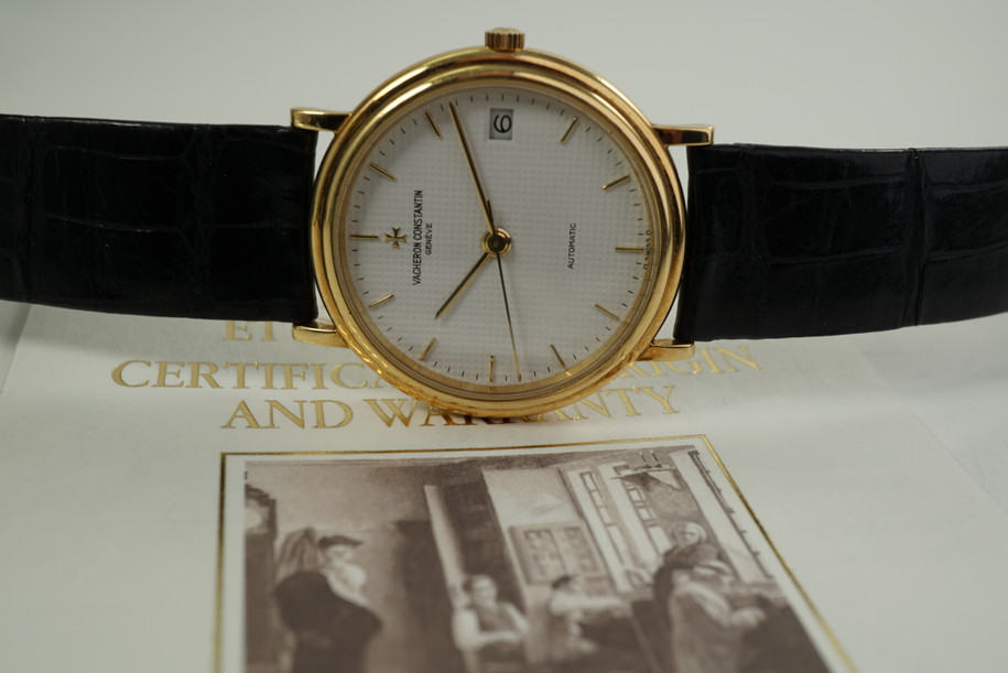 BRAND:                           Vacheron Constantin

MODEL:                           Patrimony

CASE MATERIAL:           18k yellow gold

CASE MEASURES:          34 x 38 mm

MOVEMENT:                   Automatic 

FUNCTIONS:                   Time and date

CONDITION:                    Mint

See it in our eBay store.

A fine preowned Vacheron Constantin Patrimony reference 46014 in 18k yellow gold, crafted circa 1999. Classic and minimal configuration of stepped case sitting flush on the wrist, featuring a subtle grid patterned white dial with gold applied markers and hands, paired with a black alligator strap. Would suit a variety of settings and occasions, and wrist sizes for its non-overwhelming outline. Modeled on 6 inch wrist. 

Light scratches.

Includes box, papers and wallet.

Original grid patterned white dial, hands and gold VC crown.

Case measures 34 x 38 mm.

Vacheron cal. 1124/1, 33 jewels automatic movement.

Case# 591xxx  Movement# 692xxx

Vacheron 18mm black alligator strap (70% condition approximately).

Vacheron 18k gold tang buckle.

18mm between lugs.
