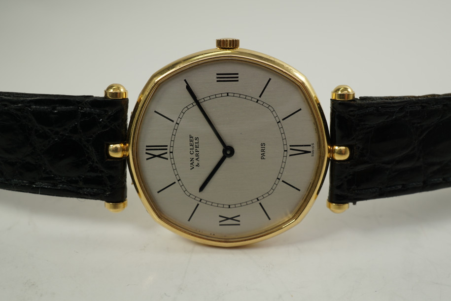 Van Cleef Arpels 6174 Man's Watch octagon shaped case 18k yellow gold c. 1980's pre owned for sale houston fabsuisse