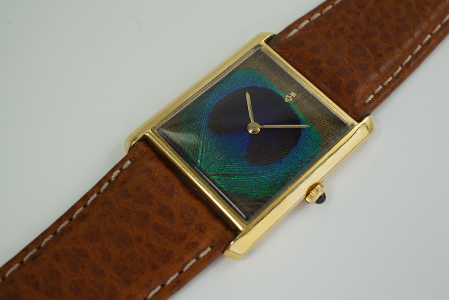 CORUM TANK WITH PEACOCK DIAL REFERENCE 57111 IN 18K YELLOW GOLD FROM THE MID 1970'S