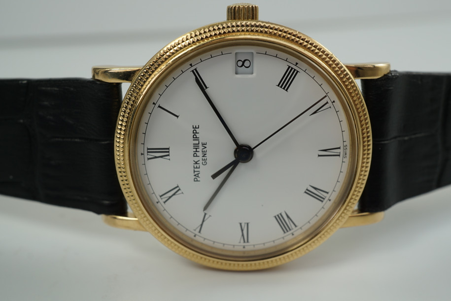 PATEK PHILIPPE 18K YELLOW GOLD CALATRAVA 3802/200 AUTOMATIC DATE CIRCA 1990'S