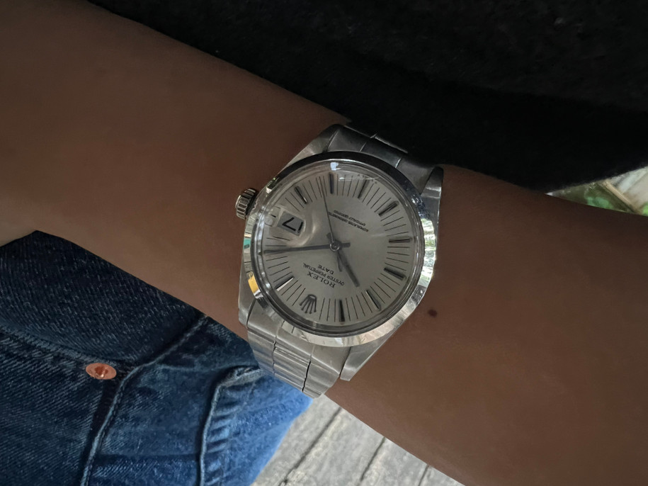 A very nice stainless steel Rolex Date with an eye-catching radial dial and classic oyster bracelet, produced circa 1972. The bracelet has a lot of wear left, and this classic model would suit a man or woman that wants a subtle piece on the wrist.