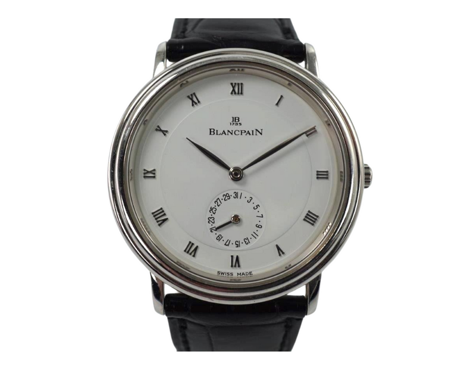 BRAND:                            Blancpain

MODEL:                            Villeret

CASE MATERIAL:            Platinum

CASE MEASURES:          34 x 38 mm

MOVEMENT:                     Automatic

FUNCTIONS:                    Time and date

CONDITION:                     Excellent

See it in our eBay store.

A fine preowned Blancpain Villeret in platinum, crafted during the 1990s. A minimal accessory with a classic white dial featuring diminutively elegant silver-toned Roman numeral markers and elongated hands contained within a stepped case and paired with a black leather strap. Would suit a variety of settings, wardrobes and wrist sizes. Modeled on size 6 inch wrist.

8mm thick case.

Blanpain cal. 4795, 19 jewels

Serial# 6x

Sapphire crystal.

Blancpain black alligator strap (75% condition).

Blancpain platinum buckle.

19 mm lug width.