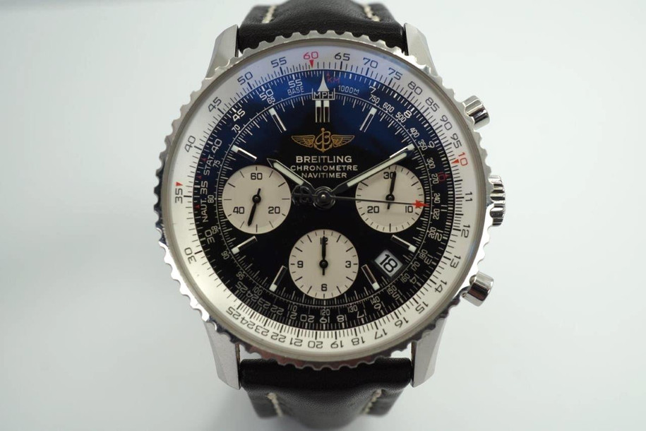 BRAND:                            Breitling 
MODEL:                            Navitimer  
CASE MATERIAL:            Stainless steel
CASE MEASURES:          41 x 48 mm
MOVEMENT:                     Automatic
FUNCTIONS:                    Chronograph and date 
CONDITION:                     Excellent
See it in our eBay store.
A modern preowned Breitling Navitimer in stainless steel, crafted circa 2010. Commands a bold presence on the wearer’s wrist, with its large 41 mm case and black and white chronograph dial, the blue antireflective film catching the light at times. Modeled on size 6 inch wrist. 

Breitling books, certificates and slide rule.
Original dial, hands and crown.
Case measures 41 x 48 mm, 9mm thick.
Breitling cal. 7753-24 automatic winding.
Serial# 2242xxx
Sapphire crystal.
Breitling black leather strap (% condition)with deployment buckle .
Breitling black leather strap with buckle, unworn.
22 mm lug width.