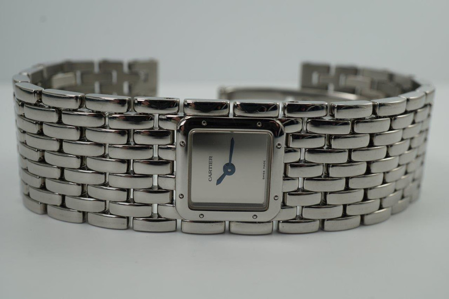 BRAND:                            Cartier 
MODEL:                            Panthere Ruban
CASE MATERIAL:            Stainless steel
CASE MEASURES:          17 mm
MOVEMENT:                     Quartz
FUNCTIONS:                    Time
CONDITION:                     Fine
See it in our eBay store.
A stunning Cartier Panthere Ruban 2420 in stainless steel, crafted during the 1990s. This is a statement piece that serves as jewelry with the supple Panthere bracelet, its steel material passing as opulent white gold. The mirrored dial will undoubtedly catch attention to the wearer’s wrist with its highly reflective property that is able to bounce off light in a dazzling way and adopt any image it captures. While the the dial is mirrored, the time is easy to read. Modeled on size 6 inch wrist. 

Light scratches.
Original mirrored dial, hands and crown. 
Case measures 17mm, 6mm thick.
Cartier quartz movement. 
Serial# 851xxPB
Sapphire crystal.
Cartier bracelet fits 6 inches approximate, 21.5 mm wide.