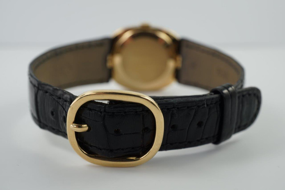 BRAND:                           Patek Philippe
MODEL:                           Ellipse
CASE MATERIAL:            18k yellow gold
CASE MEASURES:          27 x 32 mm
MOVEMENT:                   Mechanical
FUNCTIONS:                   Time 
CONDITION:                    Fine
See it in our eBay store.

A fine vintage Patek Phillipe 3548 Ellipse in 18k yellow gold, crafted during the 1970s. Its charm lies in the oval shape seen in the case, the theme extending to the buckle and strap end. Features a beautiful sunburst blue Patek sigma dial with gold hands, and paired with a black crocodile strap. Ideal for a variety of settings and outfits. Modeled on 6 inch wrist. 

Light scratches. 
Original blue and gold Patek sigma dial, hands and crown.
Case measures 27 x 32 mm, 6 mm thick.
Patek cal. 23-300, 18 jewels mechanical winding.
2 seals of Geneva. 
Sapphire crystal. 
Case# 2717xxx Movement# 12143xx
Patek black crocodile strap (75% condition approximate).
Patek 18k gold buckle. 
19mm between lugs.