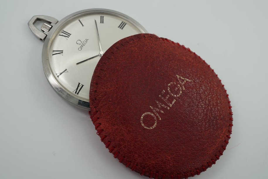 BRAND:                           Omega
MODEL:                           DeVille
CASE MATERIAL:           Stainless steel
CASE MEASURES:          44 mm
MOVEMENT:                   Mechanical
FUNCTIONS:                   Time 
CONDITION:                    Fine
See it in our eBay store.

A fine Omega DeVille pocket watch reference 131-1746 in stainless steel, crafted circa 1972. This wonderful accessory fits delightfully in the hand and has a nice light weight feel to it, and is in mint condition. Accompanies a red leather sleeve stamped OMEGA and a snake chain with Omega logo clip, unusual to find one complete. It has not been serviced, it runs and functions as normal.

Light scratches. 
Original dial, hands and crown.
Case measures 44 mm, 9 mm thick.
Omega cal. 1035 mechanical wind.
Sweep second
Case maker ADB ref. 131-1746
Serial# 358006xx
Acrylic crystal. 
Red leather pouch and fob.