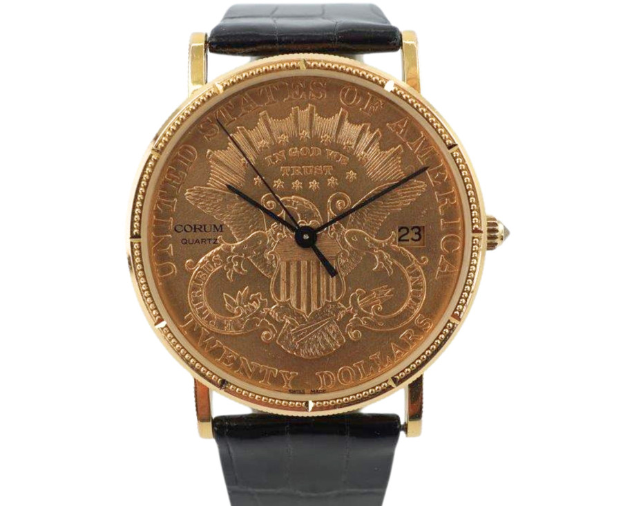 A fine Corum 20 Dollar Coin watch in 18k yellow gold, crafted during the 1990s. USA coin from 1897 exhibits little wear, with the classic ridged coin case and diamond crown. Durable for everyday wear, features a date aperture and black hands contrasting delightfully against the gold face, paired with a glossy alligator black strap. Modeled on 6 inch wrist.

Box included.
Original dial, hands and crown. 
Case measures 36 x 42 mm, 6 mm thick. 
Corum quartz, 10 jewels 
Case# 3763xx Movement# 2194xx
Sapphire crystal. 
Corum black alligator strap, unused.
Corum plated buckle. 
20mm lug width.