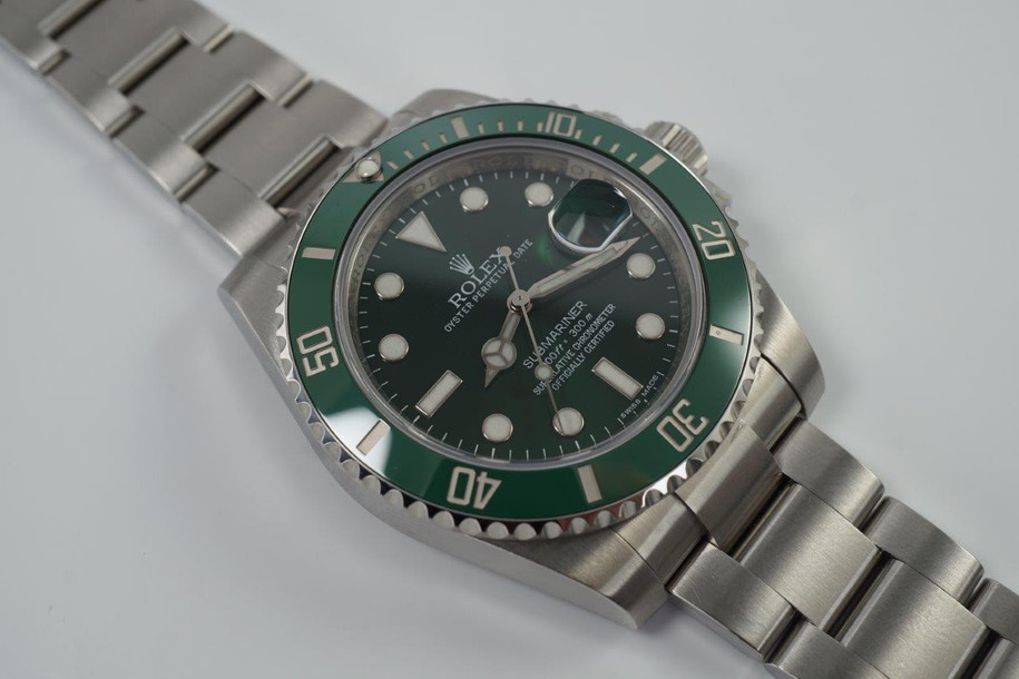 A very nice preowned Rolex Submariner reference 11610V in stainless steel, crated circa 2011. Not much more needs to be said of the popular and well-known Hulk version of the Submariner, it looks great on the wrist for those wishing a cool sports look with a pop of color with the green dial ceramic and bezel, the bold hour markers and hands providing a larger impact. Its box, card dated 04-2011 sold in the USA, and tags accompany this piece. 

Light scratches, small spot on ceramic bezel between 20-30.
Original dial, hands and sapphire crown. 
Case measures 40 x 47.5 mm.
Sapphire crystal. 
Rolex cal. automatic winding. 
Serial# G100xxx
Rolex bracelet contains 11 links, fits 7 1/2 in with glide-lock buckle. 
20 lug width.
Modeled on 5 5/8 inch wrist.