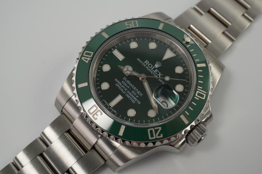 A very nice preowned Rolex Submariner reference 11610V in stainless steel, crated circa 2011. Not much more needs to be said of the popular and well-known Hulk version of the Submariner, it looks great on the wrist for those wishing a cool sports look with a pop of color with the green dial ceramic and bezel, the bold hour markers and hands providing a larger impact. Its box, card dated 04-2011 sold in the USA, and tags accompany this piece. 

Light scratches, small spot on ceramic bezel between 20-30.
Original dial, hands and sapphire crown. 
Case measures 40 x 47.5 mm.
Sapphire crystal. 
Rolex cal. automatic winding. 
Serial# G100xxx
Rolex bracelet contains 11 links, fits 7 1/2 in with glide-lock buckle. 
20 lug width.
Modeled on 5 5/8 inch wrist.