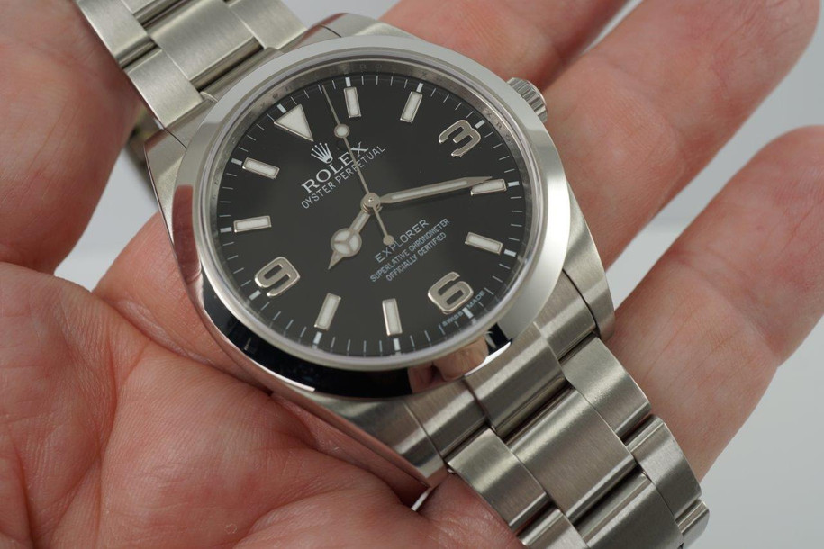 A fine preowned Rolex Explorer reference 214270 in stainless steel, produced circa 2011. Features a Mark 1 black dial, with warranty card dated June 2011 and tags. Large luminous white hands and hour markers (3,6, and 9 o’clock are non-luminous) with full set of Oyster bracelet links. Wears handsomely on the wrist.

Original Rolex Mark 1 Explorer dial, hands and crown.
Case measures 39 x 47 mm, 12 mm thick.  
Rolex cal., highly jeweled automatic winding.
Sapphire crystal.
Serial# 4600Lxxx
Rolex steel bracelet with 12 links, fits 7 3/4 inches approximate.
19 mm between lugs.
Modeled on size 7 3/4 wrist.